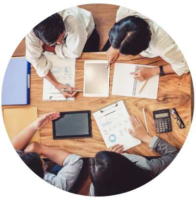 Assessment image of aerial view of people meeting at a table